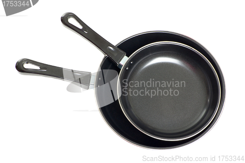 Image of 2 black pan's isolated on white