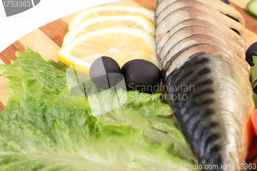 Image of herring fillets with herbs