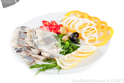 Image of fish with vegetables and olives