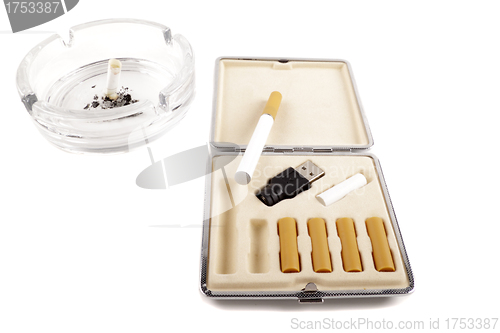 Image of electric cigarette and a real cigarette concept