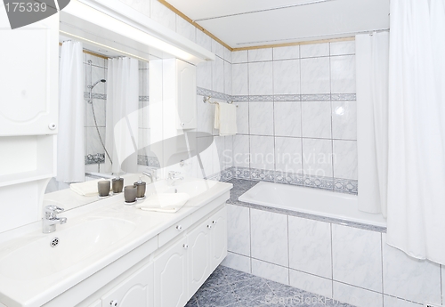 Image of Light bathroom with two sinks