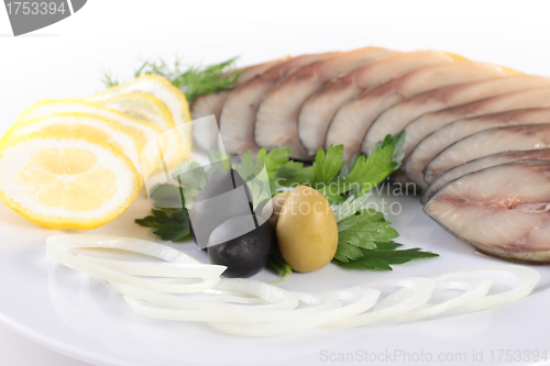 Image of fish with vegetables,anion olives