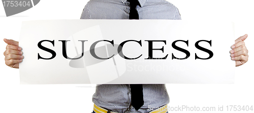 Image of Businessman holding a blank