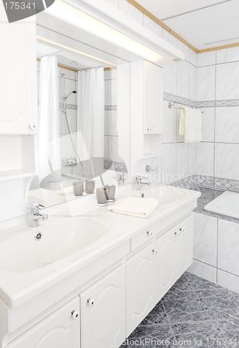 Image of Light bathroom with two sinks