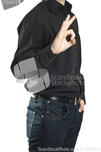 Image of Successful young businessman shows gesture okay.
