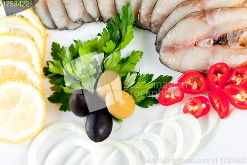 Image of sliced fish with vegetables