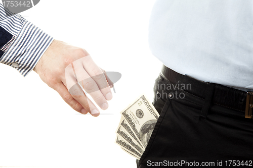 Image of Hand taking money from pocket