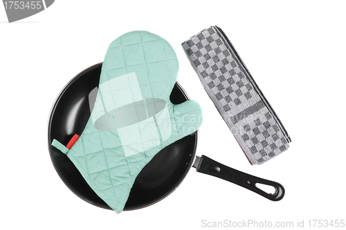 Image of Kitchen glove in pan with grater isolaetd