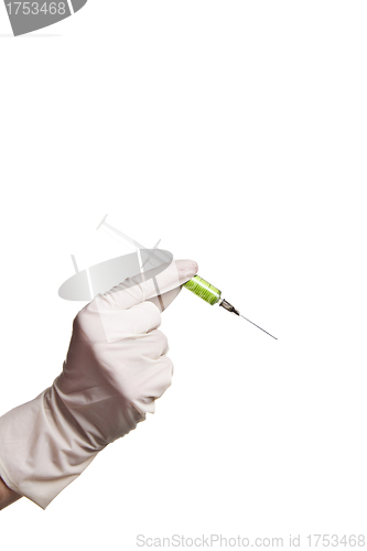 Image of Hand holding syringe isolated on white