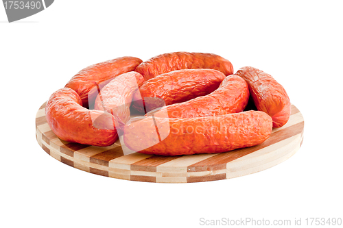 Image of delicious sausages on board