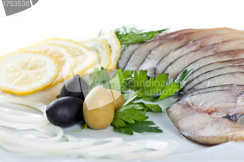 Image of sliced fish with vegetables