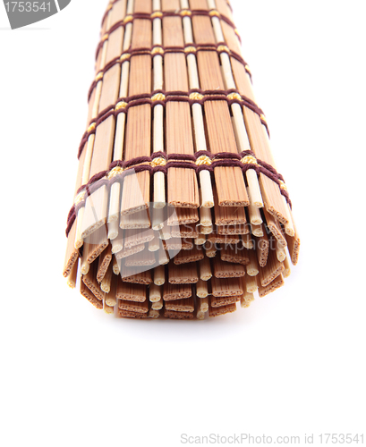 Image of folded bedding wooden tea isolated