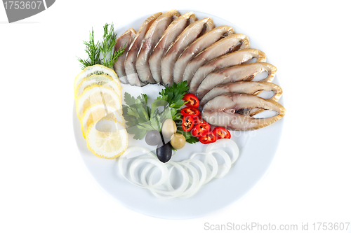 Image of sliced fish with vegetables