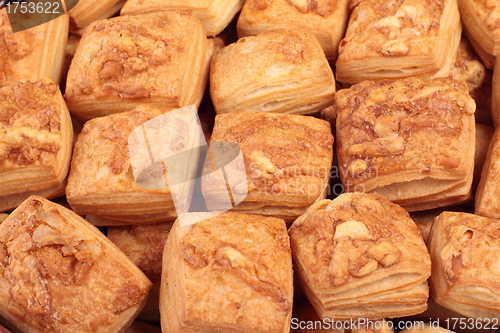 Image of buns on wooden plate