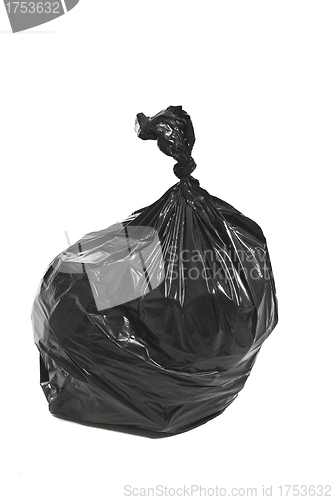 Image of Black garbage bag isolated on white