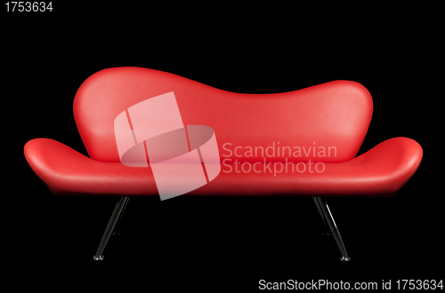 Image of Red sofa on black background
