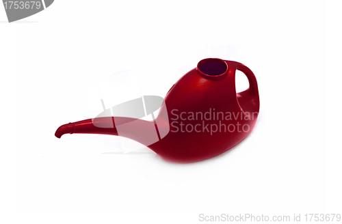 Image of red watering can isolated on white