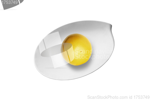 Image of lemin on plate isolated over white