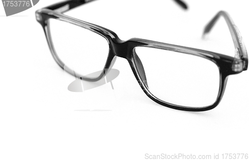 Image of Black glasses over white background