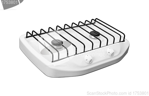 Image of stainless steel gas hob detail on white stone worktop