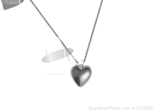 Image of Metallic heart shape in chain isolated on white. Close-up.
