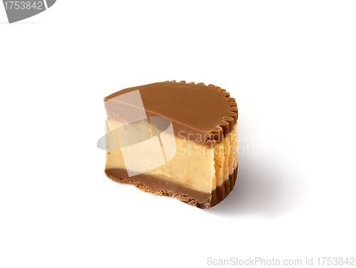 Image of Piece of chocolate cake with icing on white isolated background