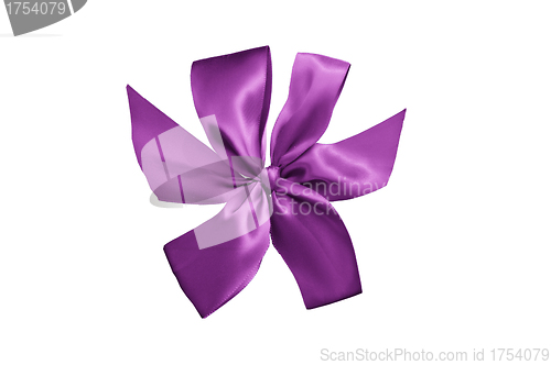 Image of purple gift ribbon with bow isolated on white background