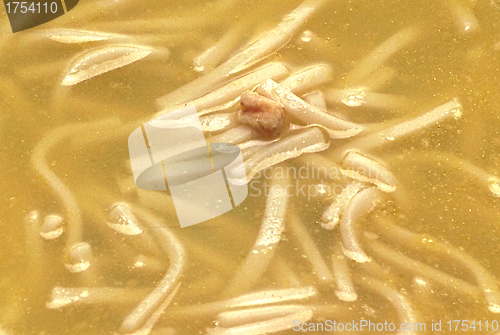 Image of A serving of chicken soup with pasta