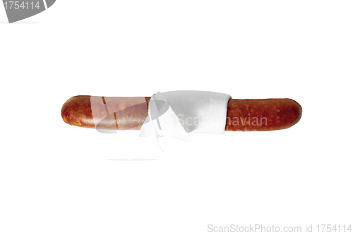 Image of close up of sausage in napkin