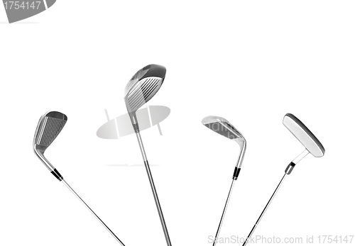 Image of four different type of golf clubs, isolated