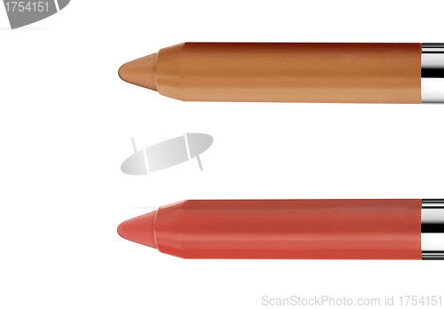 Image of two make up pencils isolated on white