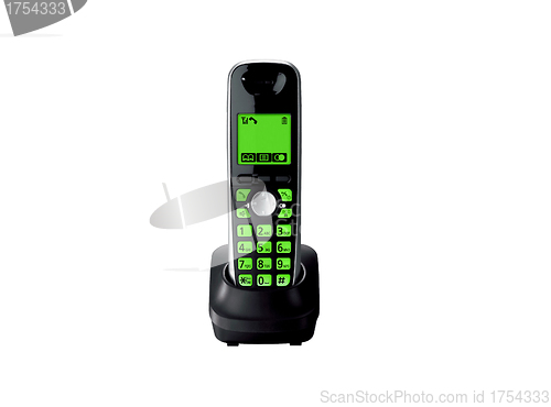 Image of Wireless green telephone with cradle isolated