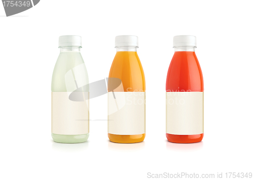 Image of Orange and grapefruit and vanille juice bottles.