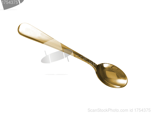 Image of gold spoon isolated on white