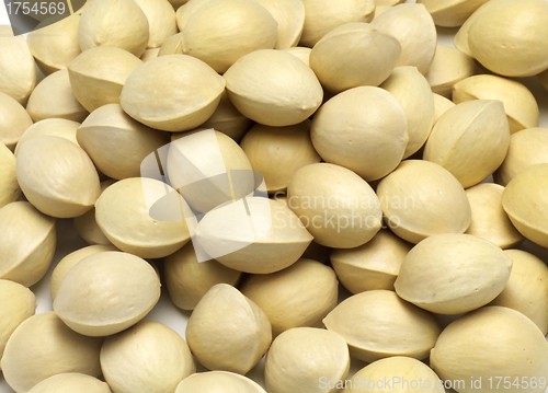 Image of many pistachios isolated on a white background