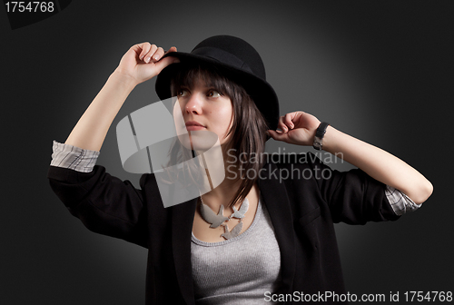 Image of Elegant woman in black hat