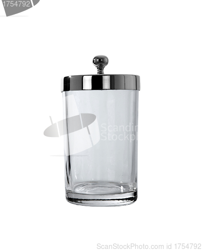 Image of Empty glass bottle standing on white background