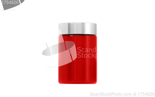 Image of Empty red glass bottle standing on white background