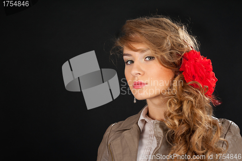 Image of beautiful attractive girl with red bow on hair