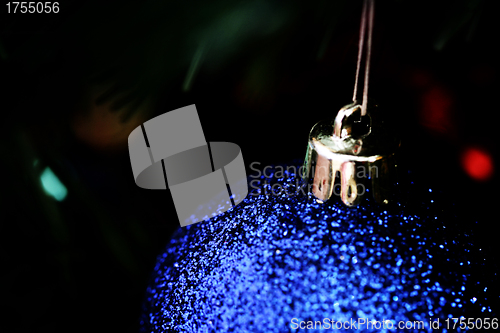 Image of Christmas ornaments on tree.