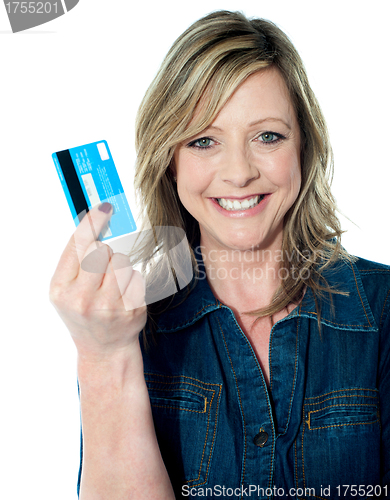 Image of Pretty attractive lady showing credit card