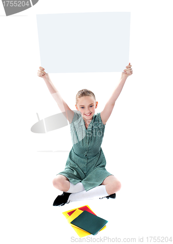 Image of Attractive girl displaying whiteboard