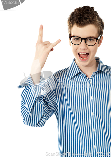 Image of Boy with a trendy YO gesture