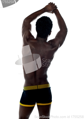 Image of Shirtless african fit guy. Back pose