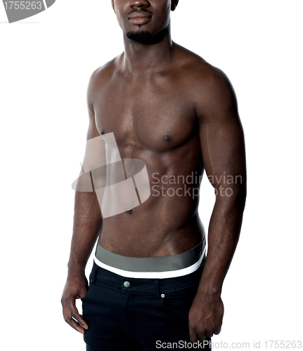 Image of Cropped image shirtless fit guy