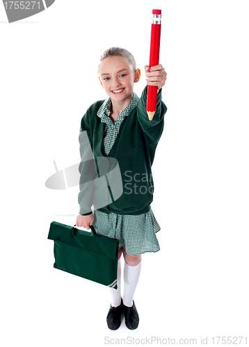 Image of Full length shot of school girl with bag