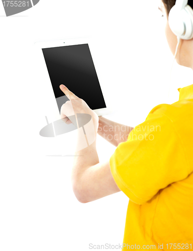 Image of Boy operating touch pad device