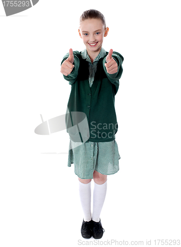 Image of Double thumbs up by young american girl