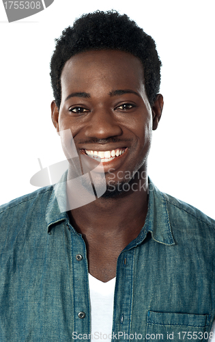 Image of Closeup of cheerful young african guy
