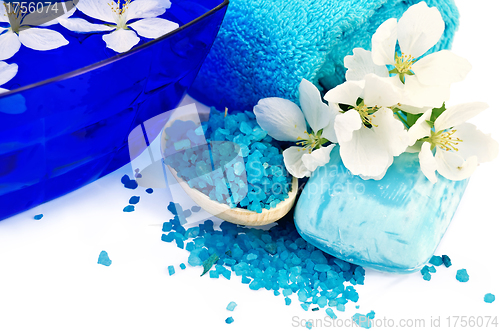 Image of Salt and soap blue with towel and flowers of apple